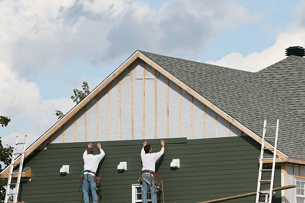 Professional Emergency Siding Repair technician working in Chelsea, MA